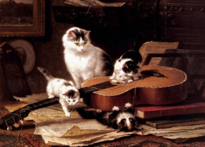 Cats playing with Guitar