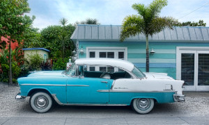 Blue Car and Beach House